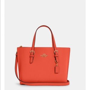 Coach Mollie Tote, Orange/Reddish in color.